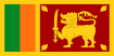 Flag of Sri Lanka featuring a golden lion holding a sword on a maroon background with green and orange vertical stripes.